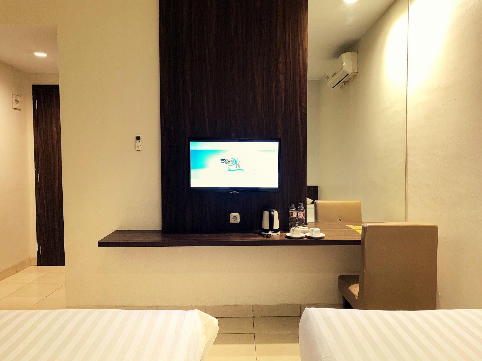 Ameera Hotel Pekanbaru Exterior photo